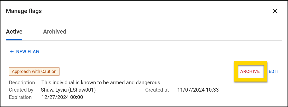 The image displays a Manage flags window. There is one flag entry, labeled Approach with Caution. It includes a description warning that the individual is armed and dangerous, with an ARCHIVE option highlighted in yellow.