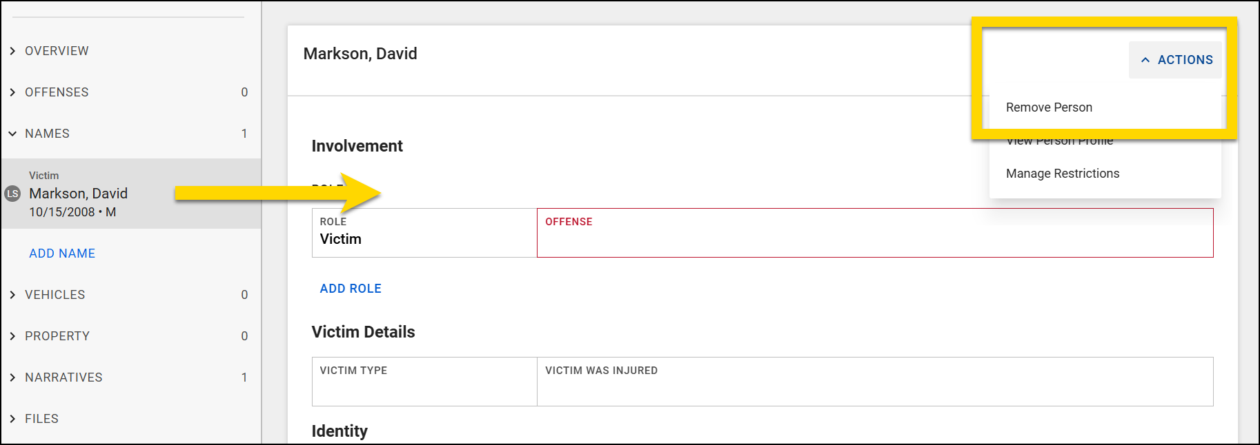 The screenshot shows Report Writer. The navigation menu on the left shows a person’s basic details in a Names section. A yellow arrow points from the person's name in the left menu to the main section, indicating that their portion of the report is open. An Actions menu is expanded in the upper-right corner, with the Remove Person option highlighted.