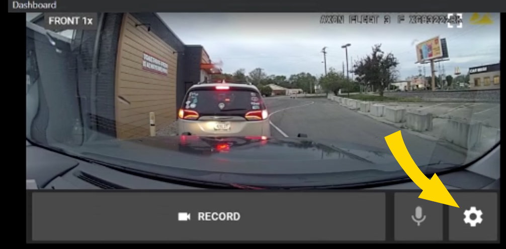 Shows a Dashboard camera tile with the camera Settings button highlighted.